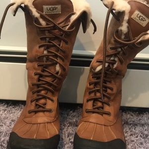 Lightly used tall lace up UGG winter boots